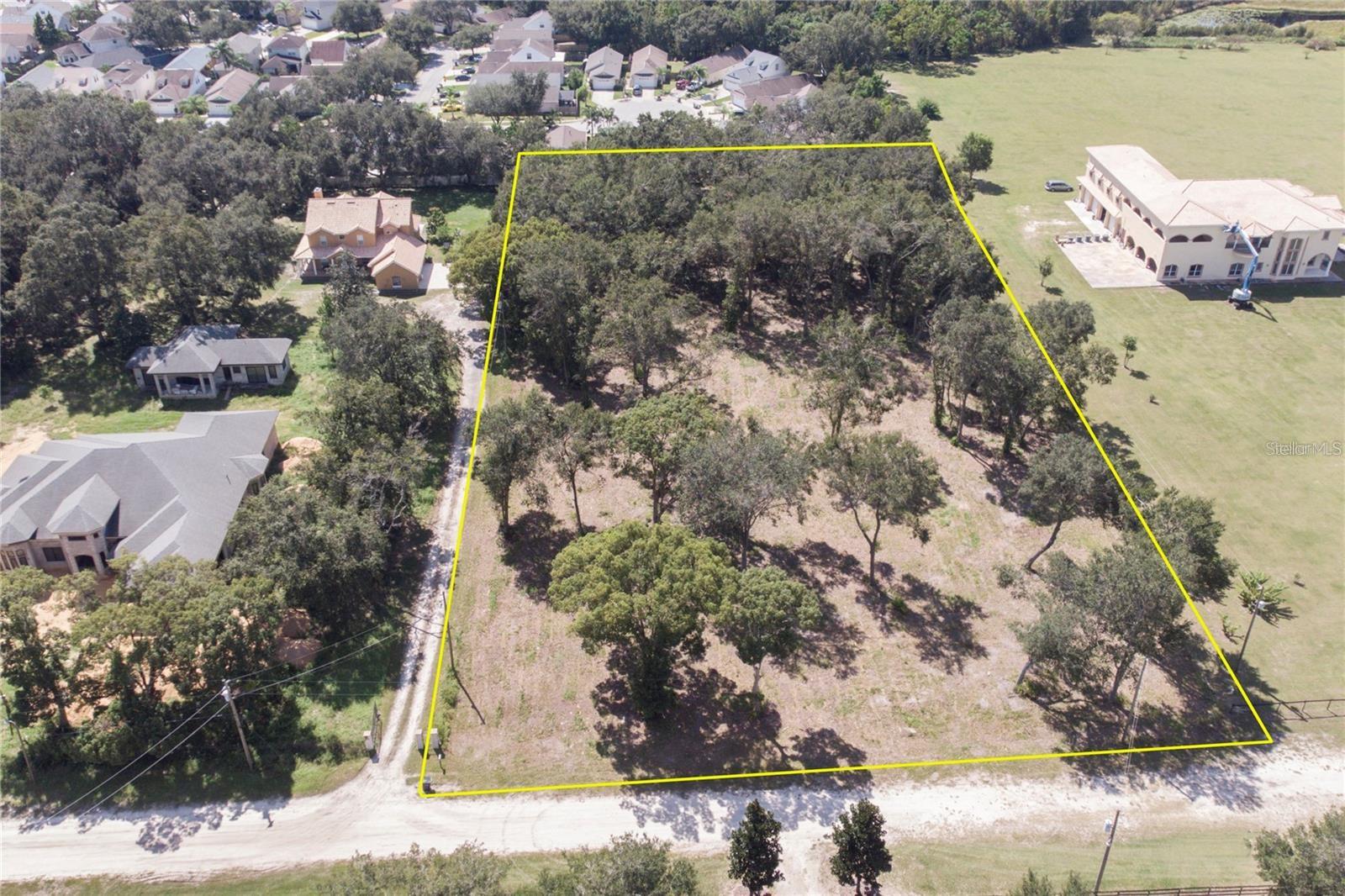 PRIME OPPORTUNITY - 2.65 acres in Wesley Chapel!
Discover this exceptional vacant land lot just across Saddlebrook Golf Resort in booming Wesley Chapel. Nestled on a quiet dead-end street with minimal traffic, ideal for a peaceful residential setting. This Land offers the perfect blend of privacy, accessibility and potential. Electricity and Water lines run right in front of the property, making it easy to connect and build. Rezoned to R3 that will let you build "up to 8 single family homes" (design available). Just few minutes away from restaurants, shopping centers, movie theaters and all new amenities Wesley Chapel has for you.
Whether you are looking to develop, invest or build your dream home in a growing and sought-after area, this property is a hidden gen with high upside potential.