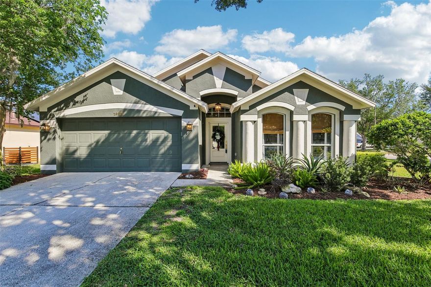 Absolutely stunning remodeled and updated Pool home on a corner lot in the gated community of Oakstead. This home is like no other with truly bespoke quality finishes and upgrades more likely to be found in homes over $2 million!  Step through the front door onto the luxury vinyl plank flooring that goes through the entire house.  Off to your right is the formal dining room and formal living room with vaulted ceilings and wainscoting.  The kitchen is gorgeous with custom cabinetry, a high-end Aga induction range with beautiful brass knobs that complement the brass cabinet handles and sconces. The range hood is custom made and finished in a beautiful plaster.  The eat-in kitchen with a custom built banquette is the perfect spot for warm and cozy casual dinners.  The kitchen overlooks the family room with a fireplace finished with shiplap and flanked by two built-in cabinets, a lovely chandelier, and a wood beamed ceiling.  Off the family room is the lanai that overlooks the nearly brand new screened in pool.  The primary bedroom has a view of the pool, a large bathroom with a shower and separate soaking tub and a walk-in closet with built-in cabinetry.  The 4th bedroom has double French doors and is outfitted with built-in bookcases and a desk.  Additional upgrades include a new roof and air conditioner in 2023.  This home is pure perfection!