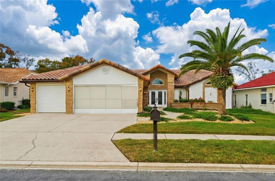 POOL HOME - NEW TILE ROOF Welcome to this beautifully maintained pool home located in the prestigious Seven Hills - The Links area of Spring Hill, offering timeless style, spacious living, and peaceful views of the former golf course. This 3-bedroom, 3-bathroom, 2,374 sq ft residence delivers Florida living at its finest with a screened-in pool, wide-open green space behind the home, and a layout designed for both comfort and entertaining. Curb appeal that pops! The Mediterranean-inspired exterior features tile roofing touches, mature landscaping, decorative brick detailing, and a sweeping circular walkway that leads to impressive double glass entry doors. The home sits proudly on a manicured lot with beautiful stone beds and a signature palm tree showcasing that classic Florida look. Grand, light-filled interior! Step inside to soaring ceilings, bright natural light, and an expansive open floor plan. The foyer opens into a spacious living and dining area with large arched windows, white tile floors throughout the main living areas.  An easy flow from room to room. Elegant lighting fixtures. The home's clean, move-in-ready feel invites endless decorating possibilities. Resort-style pool & outdoor living. Your private screened lanai is a true Florida retreat. Enjoy a sparkling in-ground pool integrated spa seating and plenty of deck space for lounging or outdoor dining. Peaceful panoramic views of the open former golf course, no rear neighbors, just tranquil scenery. This is the perfect space for morning coffee or entertaining friends year-round. Owner's suite retreat the spacious primary suite features a luxurious, spa-style bathroom complete with a deep soaking jetted tub, separate walk-in shower, dual vanities with extensive counter space, large mirrored accents, and bright natural light from a glass block window. It's a private sanctuary designed for comfort. Three-Car Garage + Storage This oversized 3-car garage offers expansive storage, workshop space, and room for golf carts, tools, or hobbies. Ideal for those who value extra space. More highlights include NEW ROOF for peace of mind, bright, open layout, screened pool and
patio, beautiful golf-course views, large indoor laundry room, on 0.20 acre lot in an HOA community just minutes to shopping, medical facilities, and the Suncoast Parkway.