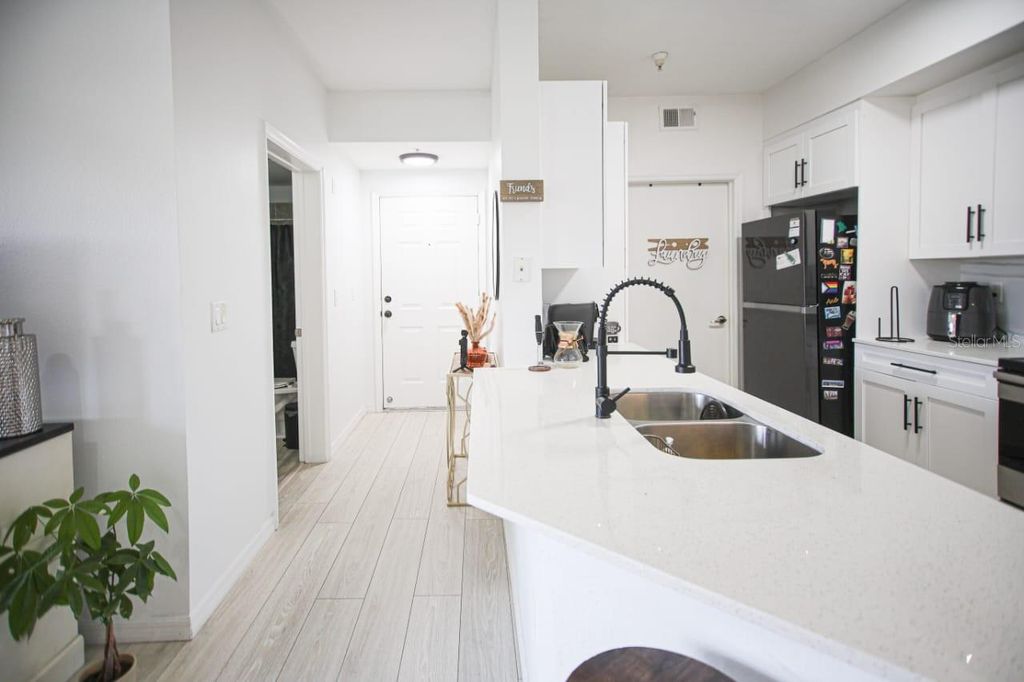 Photo of 5572 Metrowest Boulevard #311, Orlando, FL 32811 (MLS # V4948933)