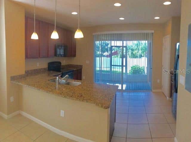Photo of 1102 Chelsea Drive, Davenport, FL 33897 (MLS # O6425597)