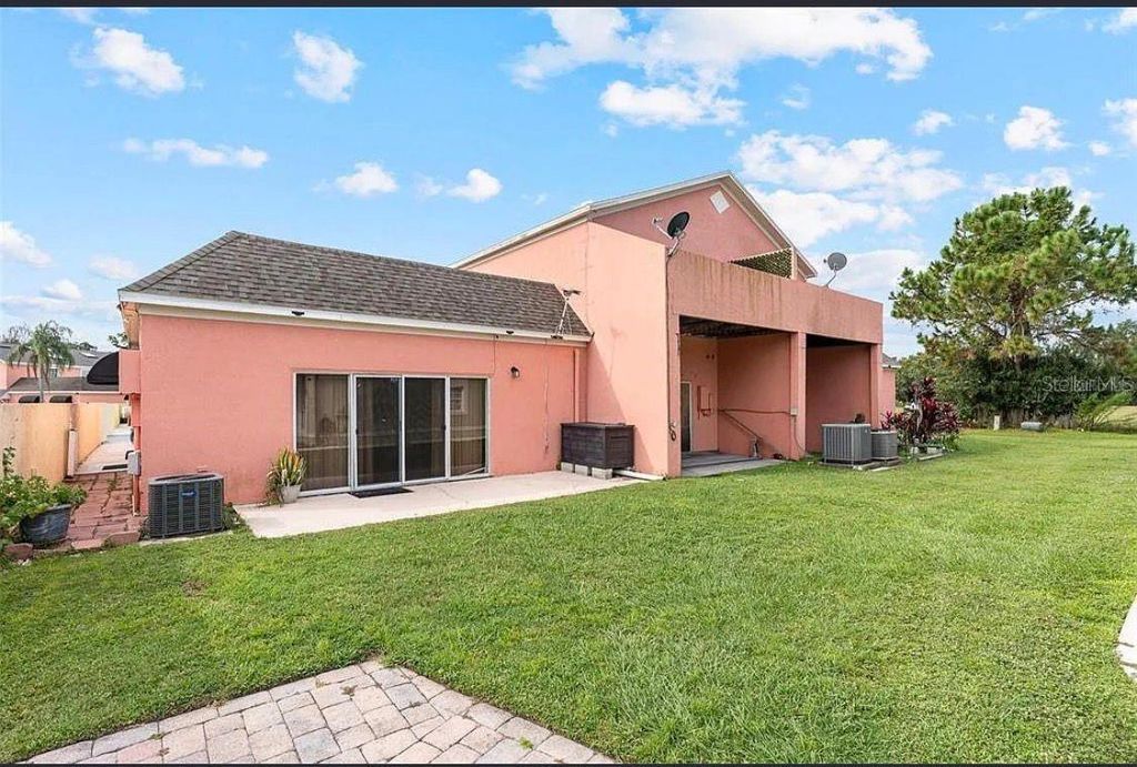 Photo of 1030 Universal Rest Place, Kissimmee, FL 34744 (MLS # S5144364)