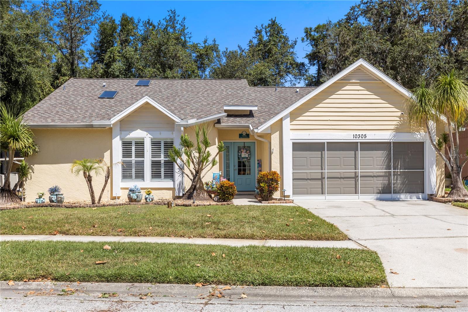 Welcome to your Florida oasis! This beautifully maintained 3-bedroom, 2-bathroom home offers 1,664 sq. ft. of comfortable living with a split, open floor plan designed for modern living.
Inside, you’ll find luxury vinyl plank flooring (2021) and plantation shutters across the original windows, creating timeless style and easy care. The kitchen is a true highlight with all-new stainless steel appliances—fridge (2021), stove with built-in air fryer (2022), backsplash (2021), and microwave (2022), alongside granite counters and plenty of storage. All bedrooms feature walk-in closets, while the bathrooms have been tastefully updated. The master retreat includes a granite-topped vanity (upgraded), mirrors with built-in storage, and a renovated walk-in shower with water barrier protection. The secondary bath offers a new vanity, a barn door, and an upgraded tile shower.
Notable upgrades continue throughout: new front door (2022), fire- and hurricane-rated garage door, ceiling fans throughout (including the living room), new electrical panel, ductwork replaced (2024), built-in garage cabinets with counters, and a whole-house water filtration system (2021).
Step outside to your private backyard paradise. Triple sliders fully open to an oversized heated, saltwater pool, recently retiled and resurfaced, surrounded by river rock, landscape lighting, and a screened lanai enclosure redone in 2022 that withstood the recent hurricanes. The home also includes an irrigation system to keep the landscaping lush year-round.
Perfectly located in the heart of New Port Richey, you’re minutes from Starkey Wilderness Park, downtown dining and entertainment, and the Gulf beaches. This move-in ready home blends thoughtful upgrades, stylish finishes, and the best of Florida outdoor living!