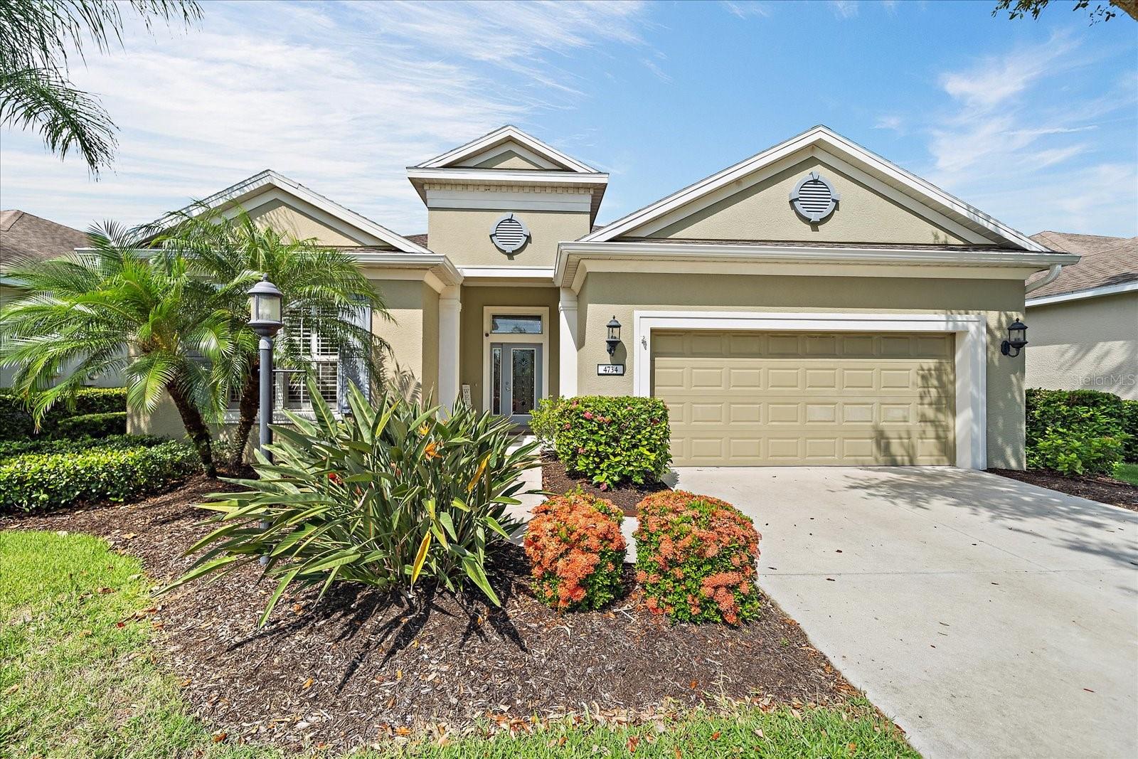 This meticulously maintained 2-bedroom + oversized den (optional 3rd bedroom) residence combines luxury, function, and privacy, all near the community pool and fitness center.
Step inside to discover elegant architectural touches including tray ceilings, crown molding, plantation shutters, and a custom glass front door with transom window. The great room offers a spacious and inviting layout with tile flooring throughout and a seamless indoor-outdoor flow, thanks to pocket sliding doors opening to the extended screened lanai—perfect for relaxing with serene preserve views.there is more than enough space in the backyard to add a pool.
The gourmet kitchen is a chef’s dream, showcasing granite countertops, solid wood dovetail cabinetry, a kitchen island, tumbled marble backsplash, stainless steel appliances (including gas stove), and upgraded pantry shelving. Recent upgrades include a newer A/C (2020/2021), new roof, water heater, refrigerator, washer, dryer, and Nest system.
Retreat to the spacious primary suite featuring a walk-in California closet, plantation shutters, new fixtures, and lighting in the ensuite bath. The oversized den provides ideal flexibility as a home office or third bedroom. Additional highlights include: new carpet and ceiling fan in bedroom 2, oversized garage with overhead storage, laundry sink, and hurricane shutters, new windows in primary bedroom and den. HOA includes lawn care, trimming, mulching, irrigation, resort-style pool & spa, fitness center, gated entry, playground, splash pad, dog park, pavilion, tennis courts, and sports fields. This home is centrally located near top-rated A+ schools, LECOM, Manatee Tech East, shopping, dining, gyms, and not far from UTC Mall, Sarasota Airport, and world-famous Gulf beaches.
Don’t miss your opportunity to enjoy low-maintenance Florida living in one of Lakewood Ranch’s most desirable communities!