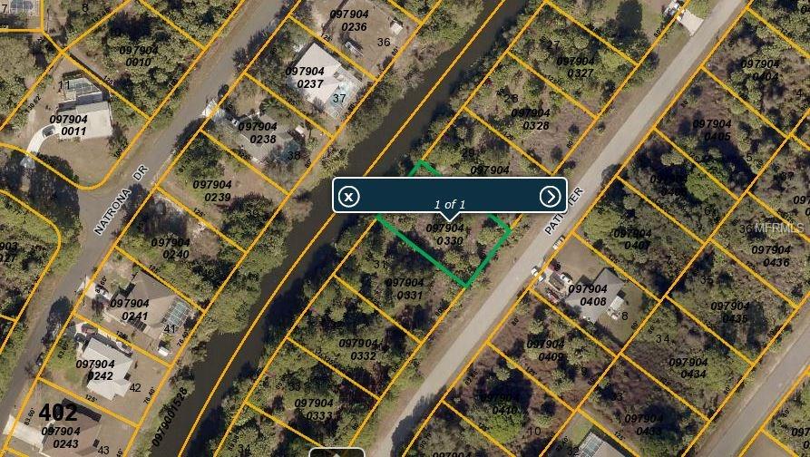 Vacant lot in the heart of North Port where you could build your new home. Good size freshwater canal in the back coming off the Snover Waterway. Come take a look at this neighborhood!