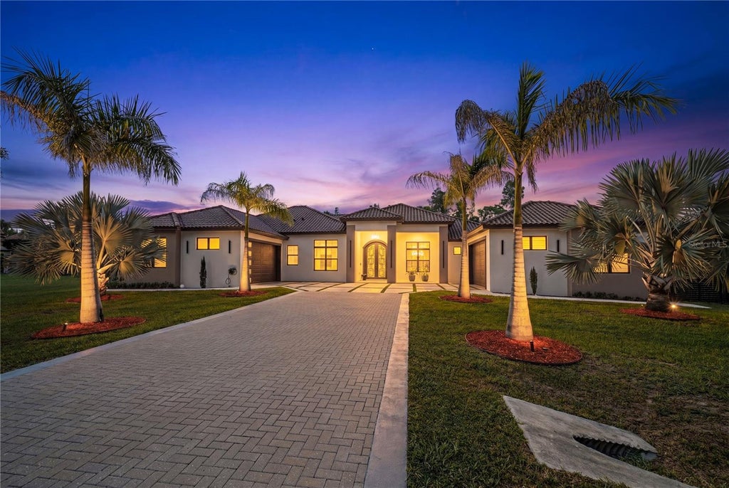 Photo of 3317 Crenshaw Lake Road, Lutz, FL 33548 (MLS # TB8521268)