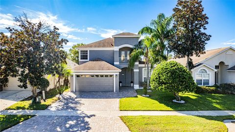 Photo of 9827 Pecky Cypress Way, Orlando, FL 32836 (MLS # O6354622)