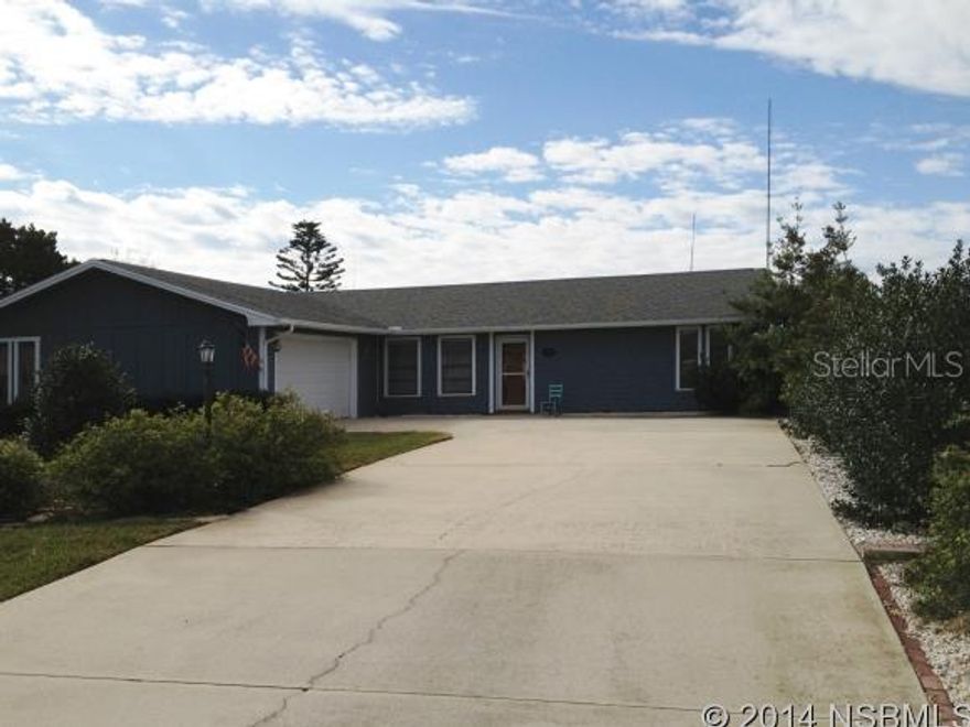 A FLORIDA LIFESTYLE BOATING , FISHING, CRUISING RELAXING.   WATER FRONT HOME PRICED TO SELL. ON DEEP WATER CANAL. BOATERS PARADISE WITHIN MINUTES TO THE INTRACOASTAL WATERWAY,PONCE INLET,DISAPPEARING ISLAND, AND THE OCEAN. MAGNIFICENT SUNSETS OVER THE BROAD CANAL AND ESTUARY. HAS A PRIVATE  DOCK AND A BOAT RAMP TO LAUNCH YOUR BOAT, KAYAK OR ANY OTHER FLOATING TOYS YOU MIGHT HAVE.LARGE DEEP LOT WITH ROOM FOR A POOL IF DESIRED.THE EXTERIOR OF THIS HOME IS HARDIBOARD SIDINGTHE INSIDE FEATURES VIEWS TO THE WATER FROM ALMOST EVERY ROOM.UPON ENTERING THE HOME THE CEILINGS ARE   CATHEDRAL VAULTED WITH SKYLIGHTS. THE RENOVATEDNEW KITCHEN HAS CRAFT MADE CABINETS,SCRATCH-RESISTANT SILE STONE QUARTZ COUNTER TOPS, A BEAUTIFUL DINING AREA , SPLIT PLAN BEDROOMS, THE MASTER HAS A VIEW TO THE WATER AS WELL AS THE 2ND BEDROOM.  KITCHEN, LIVING ROOM/DINING ROOM AND THERE IS ALSO A PINE BOARD ENCLOSED PATIO ROOM WITH LARGE WINDOWS AND STUNNING VIEWS OF THE WATER AND SUNSETS. A SMALL HOUSE WITH ELECTRICITY IN BACK YARD FOR HOBBY ROOM, OR WORKSHOP, PRIVATE OUTSIDE PATIOLARGE OVER SIZED 2 CAR GARAGE, DRIVEWAY IS OVER SIZED AS WELL, BEAUTIFUL LANDSCAPING.THIS HOUSE IS MOVE IN READY AND NEWLY PAINTED.BRING ON OFFERS. ;Water: City