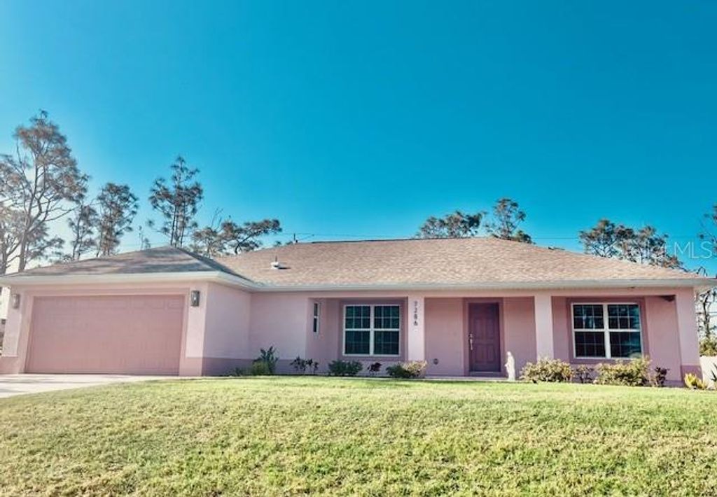 Photo of 7286 Mineola Road, Englewood, FL 34224 (MLS # A4651404)