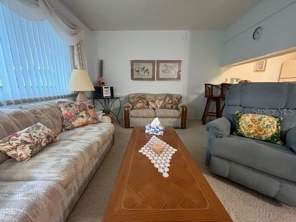 Photo of 2525 W Bay Drive #E23, Belleair Bluffs, FL 33770 (MLS # TB8452536)