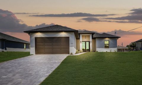 Photo of 1721 NW 2nd Street, Cape Coral, FL 33993 (MLS # A4690128)