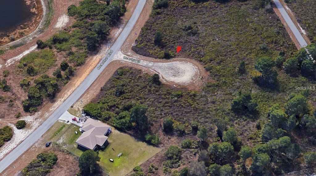 Photo of 912 Mcarthur Court, Lehigh Acres, FL 33974 (MLS # S5120461)