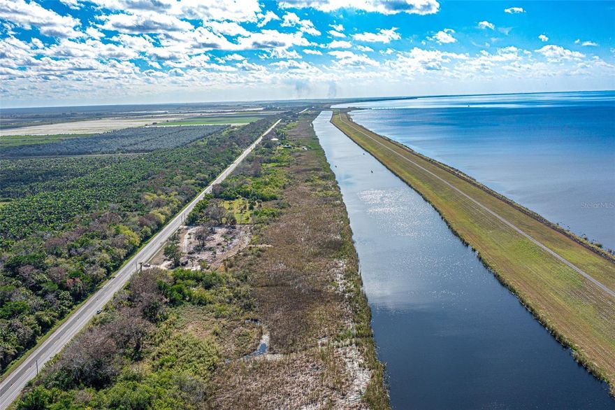 Discover your dream property with this spacious 2-acre vacant residential lot, perfectly positioned to provide tranquility and adventure! Access to the stunning Rim Canal and Lake Okeechobee, this property is an incredible opportunity for those who love waterfront living and outdoor activities. Plus, with boat docks allowed, you can enjoy seamless access to the lake right from your backyard!