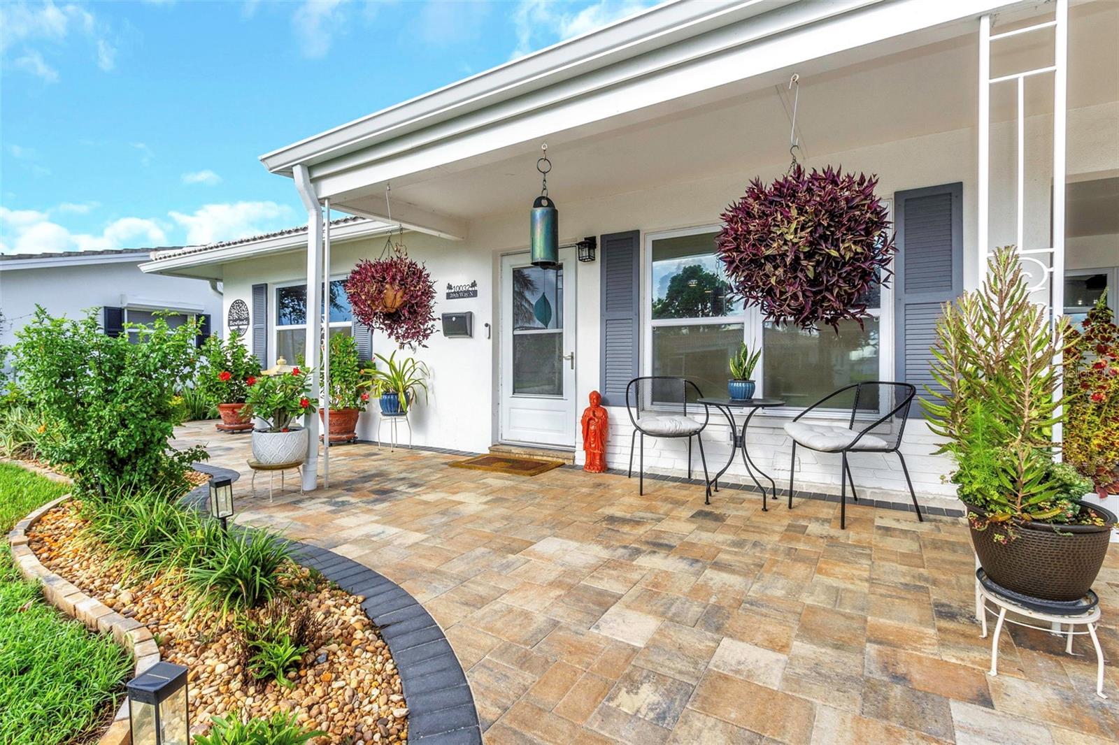 Welcome to this beautifully updated Carlton model in the friendly 55+ community of The Mainlands, Unit Three. This three-bedroom home is truly move-in ready and offers standout curb appeal with fresh landscaping, new paver pathways, a spacious rear patio, a double paved parking pad, and a charming covered front porch.
Inside, the open floor plan features a dream kitchen with a large island, quartz countertops, soft-close cabinetry, and brand-new stainless steel appliances. Easy-care wood plank tile flooring flows throughout the home, creating a modern and cohesive feel. The spacious dining area is perfect for family meals and entertaining. At the rear of the home, a versatile bonus room overlooks the backyard and makes an ideal den, home office, or guest space. This room also includes a convenient ensuite half bath combined with the laundry area. Two comfortable bedrooms and a fully renovated bathroom complete the interior.
This property truly stands out in a community where many homes look alike — offering unique updates and thoughtful touches inside and out.
Unit Three residents enjoy their own exclusive recreation area, featuring a clubhouse with meeting rooms, a stage, a full kitchen, and a library. Outdoors, there’s a large swimming pool, shuffleboard courts, and outside cooking facilities. A full calendar of social events, organized by the Unit Three Social Club, brings neighbors together for breakfasts, dances, bingo, and more.
The monthly maintenance fee of $477 covers water, sewer, trash, cable/internet, lawn care, irrigation with reclaimed water, exterior painting and pressure washing, and roof repair/maintenance — making this true maintenance-free living. The community also welcomes golf carts and up to two domestic pets.
Conveniently located off US-19, The Mainlands offers easy access to shopping, dining, downtown St. Petersburg, Tampa, and award winning Gulf beaches. Whether you’re seeking a full-time residence or a seasonal retreat, this home delivers the perfect blend of style, comfort, and Florida lifestyle.