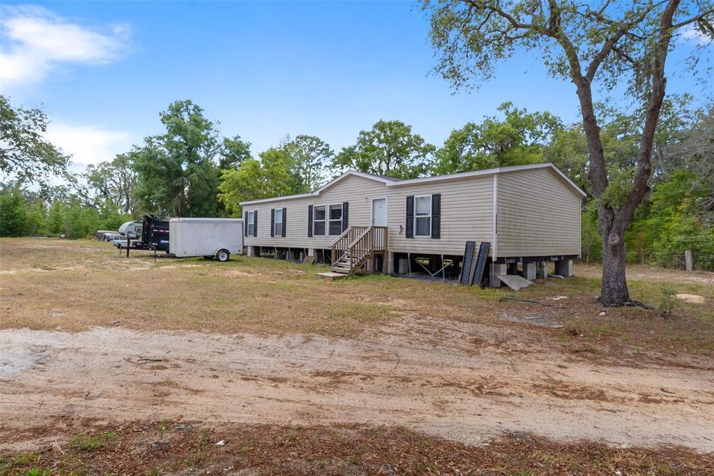 Photo of 12414 Choctaw Trail, Hudson, FL 34669 (MLS # W7885483)