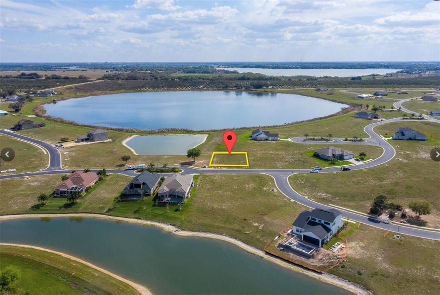 Back on the Market... MOTIVATED SELLER. Looking for PRIVACY? ALMOST A LAKE FRONT LOT. This is NOT an interior lot, do not be fooled by low prices on other lots if you are looking for privacy and unobstructed lake views (Lake Medora and 2 ponds). NO neighbor on the east side and NONE in the back for maximum privacy. Partial view of Lake Van from the front. Bring your builder and build your dream home. Community has several Tennis & Basketball Courts, 3 pools, an impressive club house and fitness center including 2 saunas, 2 boat ramps to access Lake Van & Lake Alfred, and more, much more. This lot has Impact Fees partially paid, you could be saving between $5K to $9K.
