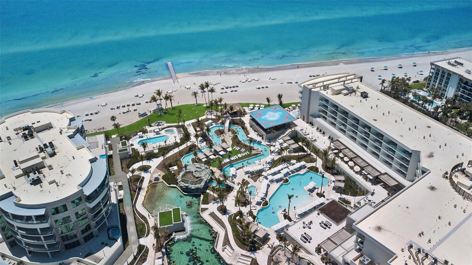 Welcome Serenity Oasis, your paradise at The Residences at the St.?Regis on Longboat Key—where luxury, elegance, and coastal charm converge in this stunning 1-bedroom, 2-bathroom condo. From the moment the elevator opens directly into your private entryway, you’ll be captivated by the exquisite design and attention to detail throughout this sophisticated retreat.
The expansive living room is thoughtfully furnished with a plush sectional, creating the perfect place to unwind after a day of feeding stingrays at Under The Sea or soaking up the Florida sunshine by the residence pool or the pristine Gulf-front beach.
The chef’s kitchen is a dream come true, outfitted with top-of-the-line appliances, sleek cabinetry, and a spacious island with three barstools—ideal for casual bites or entertaining in style. Step outside to your private patio, an inviting space for morning coffee, or evening cocktails. With a built-in outdoor grill and outdoor seating, it's perfect for gatherings with family and friends.
The luxurious primary suite offers a king-size bed, a smart TV, and direct access to the patio. The attached primary bathroom is a spa-like sanctuary, featuring a dual vanity, indulgent soaking tub, expansive walk-in shower, and a high-end Toto toilet for ultimate comfort.
The second bathroom is equally refined, offering a spacious walk-in shower and elegant vanity, providing a seamless experience for guests.
This residence has everything you need—and more—to truly relax, unwind, and enjoy a life of luxury in one of Longboat Key’s most prestigious addresses.
Immerse yourself in unparalleled relaxation and luxury at The St. Regis Longboat Key Resort, where every detail has been thoughtfully curated to deliver an extraordinary experience. Nestled among soaring palms and lush tropical landscaping, the resort's centerpiece—known as “The Pools”—offers a serene escape with a variety of sparkling swimming pools, plush loungers, and private cabanas designed for ultimate comfort and seclusion.
Just moments from your doorstep, the private beach invites you to unwind with attentive service and uninterrupted views of the Gulf of Mexico. Additional world-class amenities include the indulgent St. Regis Spa, a state-of-the-art Fitness Center, and an engaging Children’s Club—ensuring that every member of your party experiences the very best of coastal luxury.
The residences enjoy their own private area, thoughtfully separated from the resort for added exclusivity. Here, a serene pool and spa overlook the breathtaking Gulf of Mexico, offering a peaceful retreat just steps from your door. The outdoor space features grills and seating areas—perfect for hosting gatherings with friends and loved ones. Stay active in the state-of-the-art fitness center, fully equipped with everything you need for an energizing workout. You'll also find convenient touches like a resident-only coffee station and more, designed to elevate your everyday living experience.
Please Note: Upon arrival, guests must check in at the concierge desk in order to access their unit.
House Rule: No smoking. No burning candles inside of lodging. No parties. No Pets.
While on property, please note that all spa treatments and dining experiences must be paid for at the time of service. Charging services to the unit is not permitted.