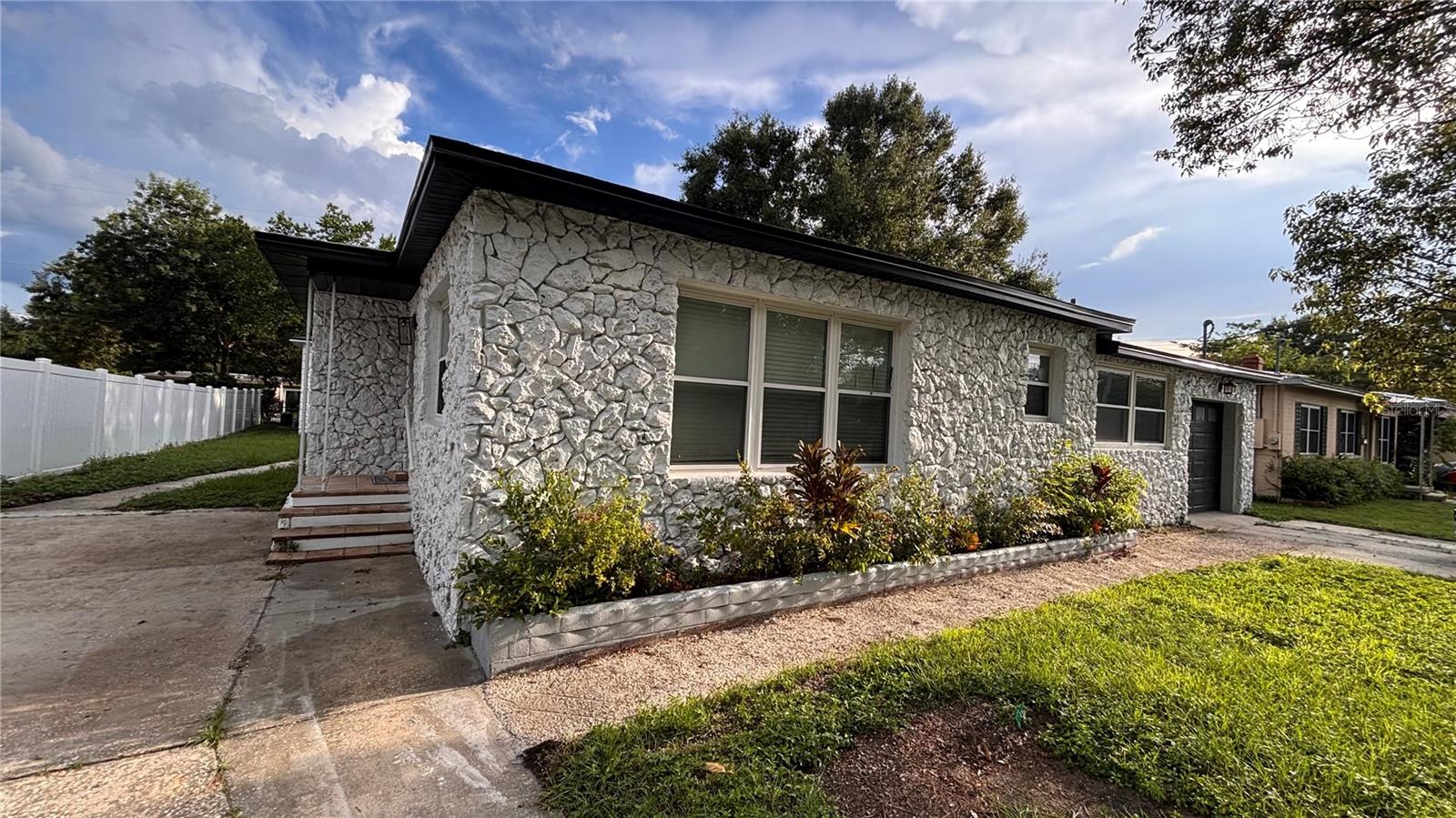 2 units for the price of 1!!! Totaling 3/2 1600 sq ft! This beautifully updated 2-bedroom, 1-bathroom main home is truly move-in ready with a separate 1-bedroom, 1-bathroom Accessory Dwelling Unit (ADU) in the back—perfect for rental income, a private guest suite, or multi-generational living. Featuring brand-new flooring throughout, a modern kitchen with sleek cabinetry and countertops, and a fully remodeled bathroom, every detail has been thoughtfully finished. The home also offers a bonus room, providing extra flexibility for an office, playroom, or guest space. Freshly painted inside and out, this home is ready for its new owner to move right in with peace of mind.