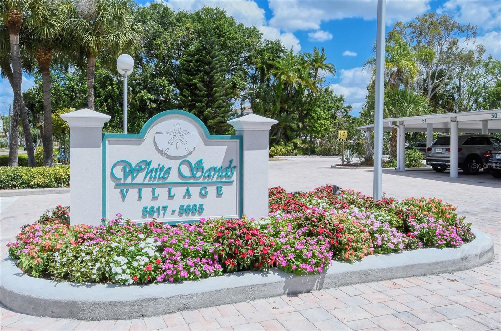 Make sure to see to this slice of paradise across the road from the beautiful ranked #1 Siesta Key Beach. This is being sold turnkey furnished all you need to do is bring your tooth brush. This condo has been updated and all of the appliances are within the last few years. The A/C has just recently been replaced. This complex did not have any flooding at all during the hurricanes and this unit is on the second floor. There is a wonderful screened lanai off the living room that looks over a lovely garden. This unit is nicely furnished with everything you would need at your new Beach condominium. Covered parking for one car and guest parking for other cars. The community amenities are wonderful they consist of an active clubhouse, a library, large swimming pool, extra laundry machines on property for your large items, BBQ grills and picnic areas and first come first serve boat docks and fishing area in a cove of the intercoastal. Having the Beach across the street offers, playgrounds, picnic areas, concession booths, volleyball, tennis and pickleball along with the lifeguard protected beach and swimming area. This is a pet friendly association as long as the pet is no larger than 25 pounds. The rental period is a minimum of 2 weeks all the way to year round. There is a management team on property to help with rentals and maintenance of the property. It is a well managed and well cared for complex.