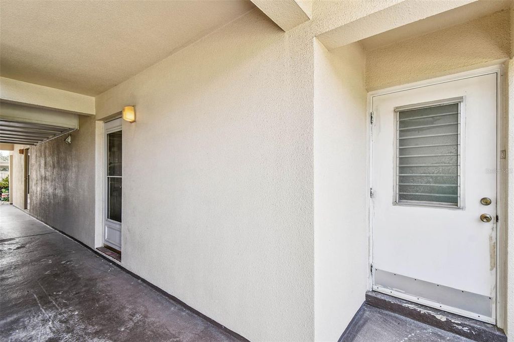 Photo of 4726 Marine Parkway #103, New Port Richey, FL 34652 (MLS # TB8414381)