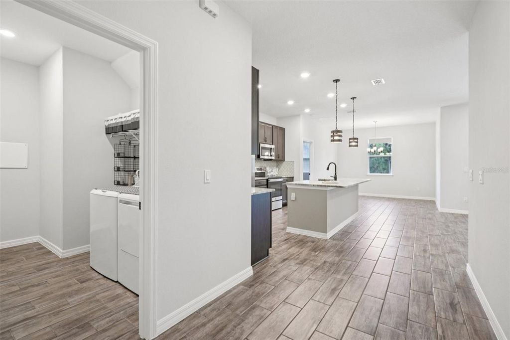 Photo of 3360 Curlew Avenue, Leesburg, FL 34748 (MLS # O6389048)