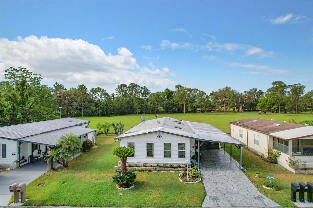 Photo of 6518 Raintree Lane NE, Winter Haven, FL 33881 (MLS # S5136893)
