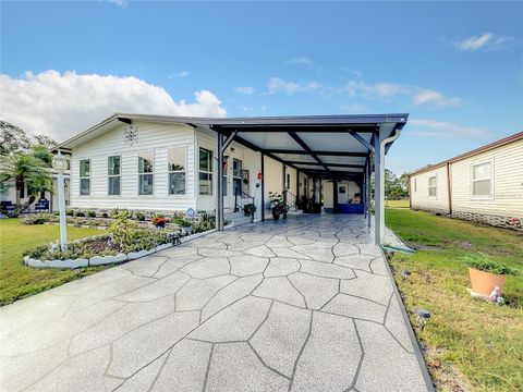 Photo of 6518 Raintree Lane NE, Winter Haven, FL 33881 (MLS # S5136893)