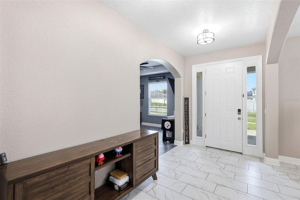 Photo of 1346 Lake Baton Drive, Deltona, FL 32725 (MLS # V4949722)