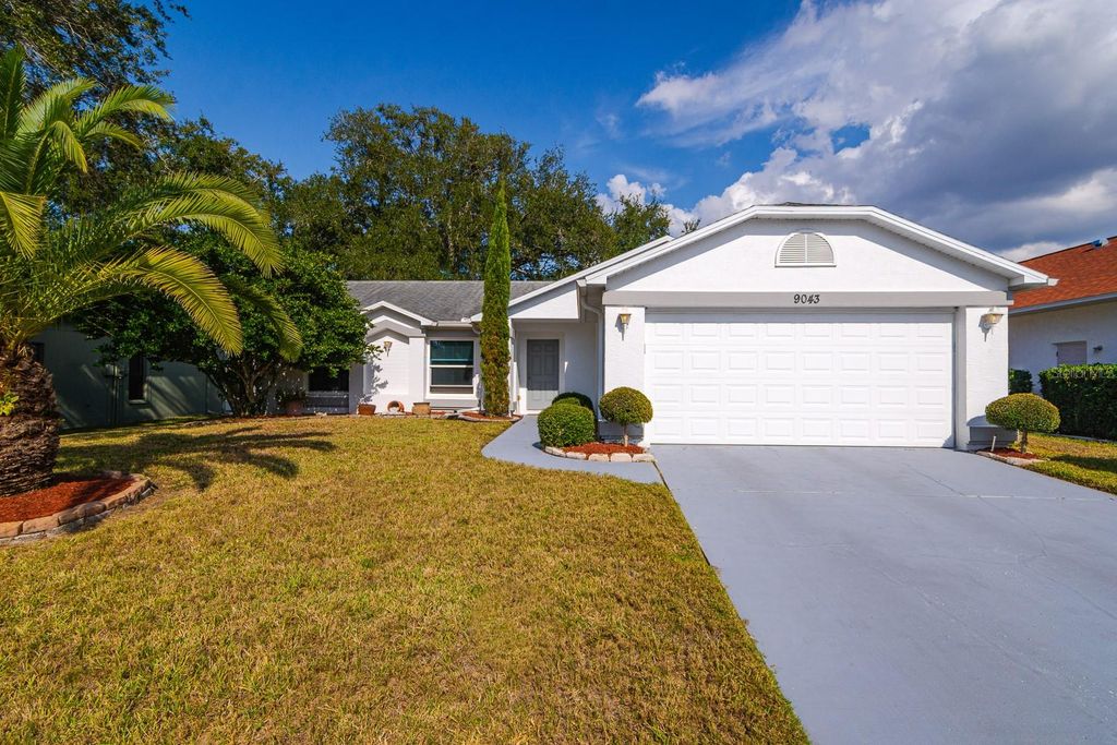 Photo of 9043 Tournament Drive, Hudson, FL 34667 (MLS # TB8451815)