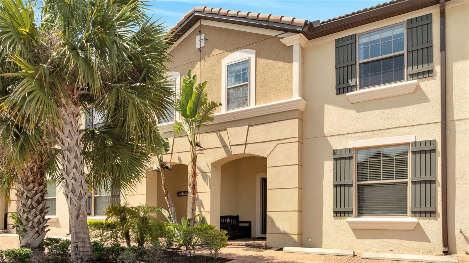 ***RECENTLY RENOVATED*** Don't miss the opportunity to enjoy a resort living style in this magnificent 5 bedroom 4 1/2 bathroom townhome with a private pool located at Windsor at WestSide Resort. This gated community offers wonderful resort style amenities, such as pool, lazy river, arcade, splash pad, basketball court, and more. The community constantly have events for guests to enjoy and it is strategically located close to the Disney parks. The house features 1 bedroom downstairs and 4 bedrooms upstairs of which 2 are masters bedrooms. It also has a loft and it is professionally decorated and furnished.. This house was recently painted and the kitchen was renovated with new backsplash and cabinetry painting. Also, Carpet from the common areas was replaced with high quality vinyl floors. it has new light fixtures and fans. curtains, and many more upgrades. No rear neighbors as the back of the house faces a conservation area.