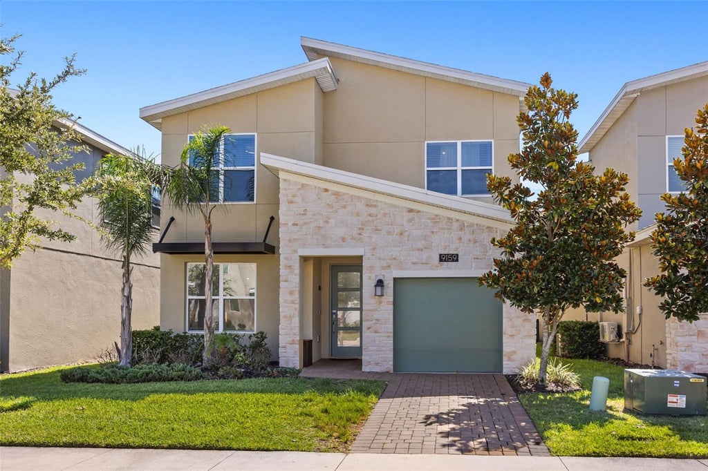 Photo of 9159 Sommerset Hills Drive, Davenport, FL 33896 (MLS # O6426312)