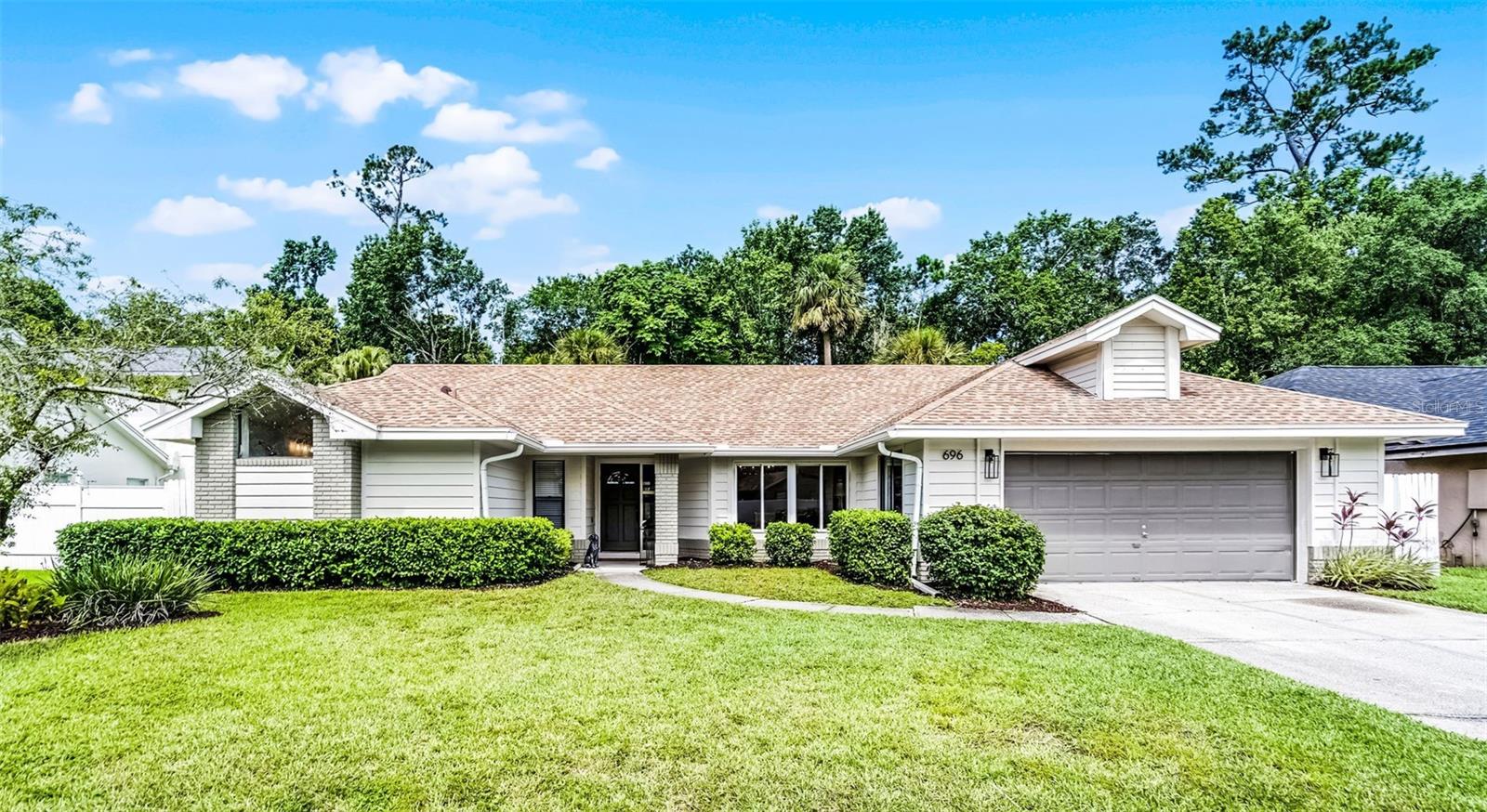 THIS IS THE ONE!!! Beautifully remodeled home in the tranquil neighborhood of Winter Springs, Oak Forest. Open floor
plan welcomes you to a 4 Bedroom, 2 Bath, pool home. Roof 2022, AC 2021, Hot Water Tank 2023, Replumbed 2020, Pool Pump and
Filter -2023, Remodel – Kitchen/Baths 2023, Luxury Vinyl Floors – 2023. Gourmet kitchen features huge center island, 42” shaker
cabinets, quartz counters, designer backsplash and stainless appliances. This home is perfect for entertaining large crowds! Split
floor plan offers a large primary bedroom with en-suite bathroom. Oversized shower, double vanity, and walk-in closet. Additional 3
bedrooms are on opposite side of home with a fully remodeled bath. Large great room has wonderful views of the lanai and pool area,
allowing loads of light. This home has great closet space! Incredible back yard oasis with amazing pool and screened lanai that backs
to private conservation. Fully fenced yard. Designer selected color paint scheme both inside and out. Optional HOA. This home is
located close to SR 417, Shopping, Dining and the perfect neighborhood for evening strolls. A+++ Seminole Schools. What more
could you want? Hurry and see it today!