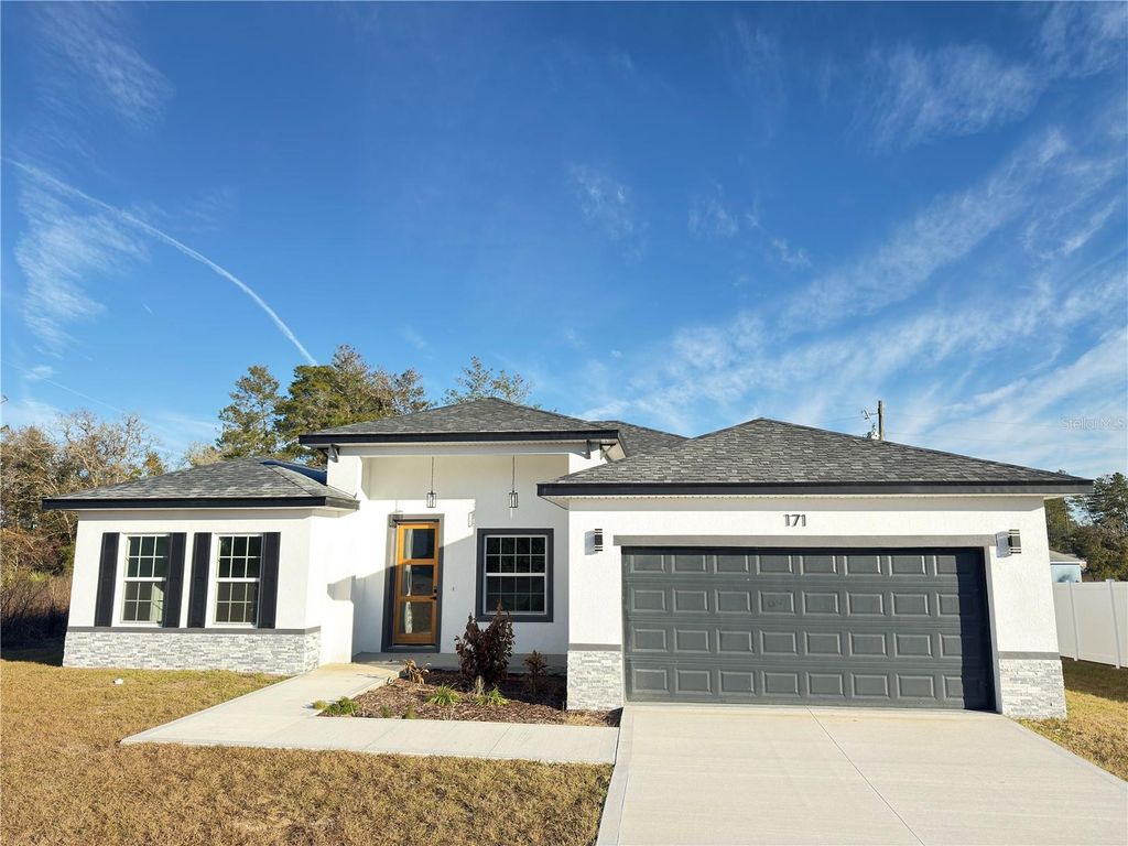 Photo of 171 Marion Oaks Trail, Ocala, FL 34473 (MLS # O6377608)
