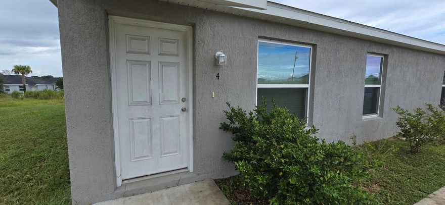 Spacious 1 bed, 1 bath apartment in Silver Springs Shores.  Laminate flooring throughout.  Granite countertops in kitchen and bathroom.  Open kitchen with plenty of bar top space overlooks living room.  Double vanity sink in bathroom.  Separate laundry room.  Covered back patio.