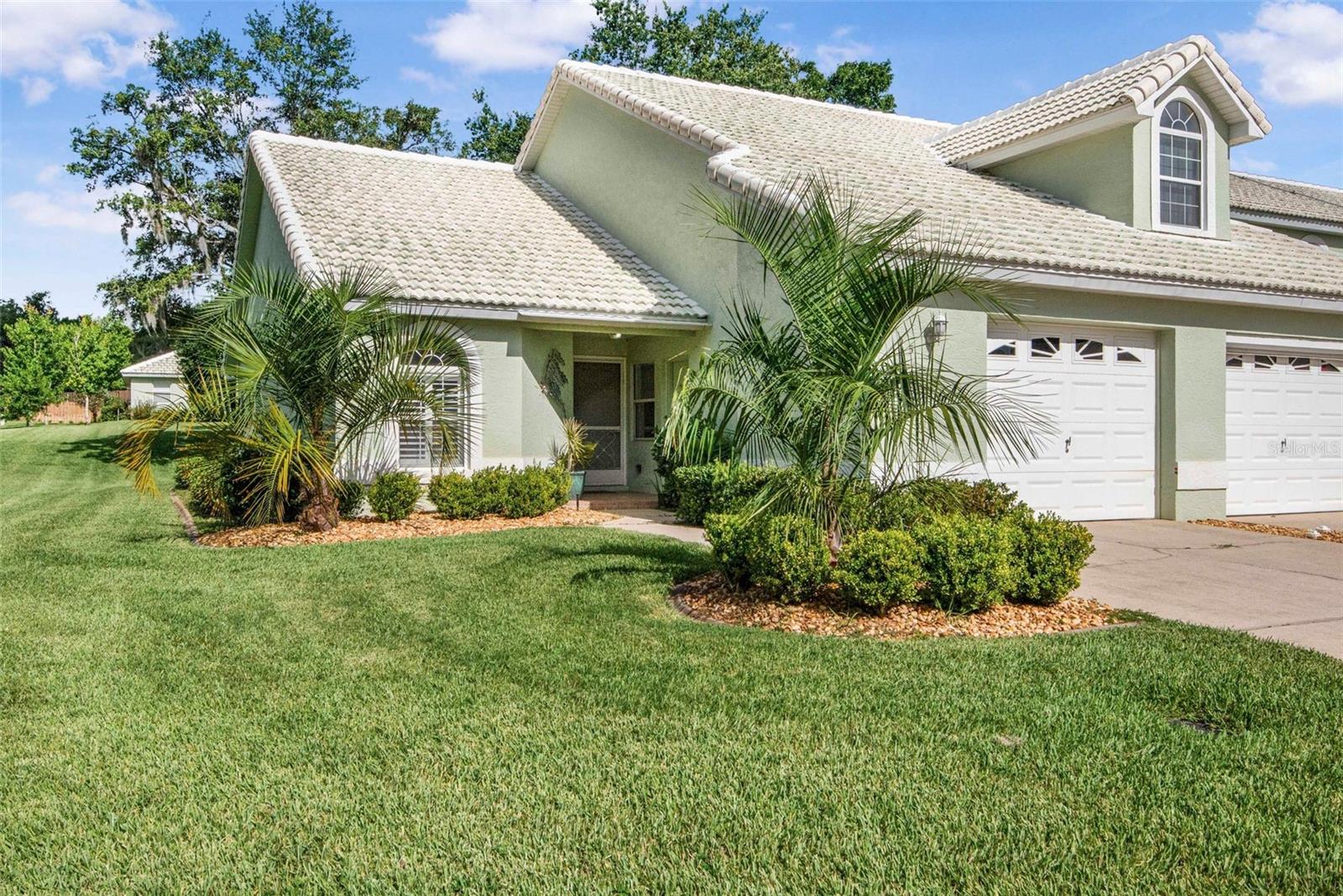 Come and enjoy Windermere, a well established, well maintained and sought after community. This beautiful end unit also sits at the end of a cul de sac offering peace and quiet and a lovely view from your rear patio. This home features wood cabinetry, corian counters and wood flooring throughout. You'll love the natural light, neutral palette, high ceilings and plantations shutters, all of this gives a clean, yet crisp look and feel. This community offers RV and boat parking in a secure lot as well as a private dock and gazebo to add to your enjoyment of your lake adventure. For more enjoyment, there is the 41 miles of rails to trails, take a great walk or hop on your bike and enjoy the outdoors. Inverness is also home to great parks, shopping, eateries, festivals and concerts. You are near it all! Don't delay, call today this villa is ready and waiting for you.