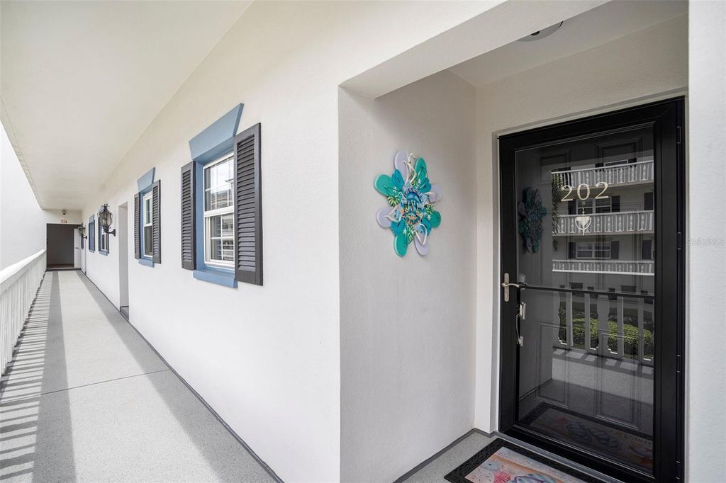 Photo of 139 Bluff View Drive #202, Belleair Bluffs, FL 33770 (MLS # TB8425659)