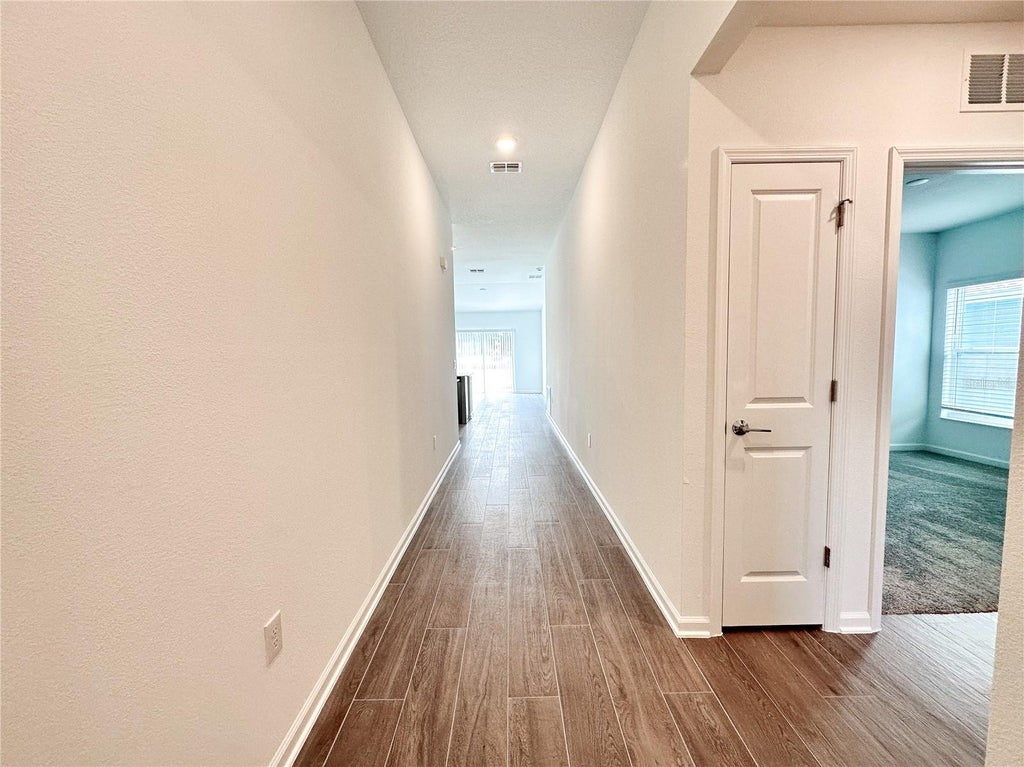 Photo of 309 Loch Court, Davenport, FL 33837 (MLS # O6451159)