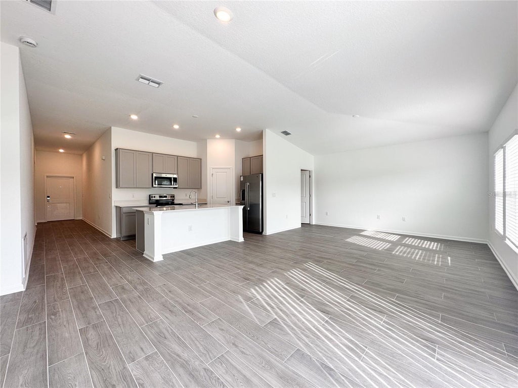 Photo of 309 Loch Court, Davenport, FL 33837 (MLS # O6451159)
