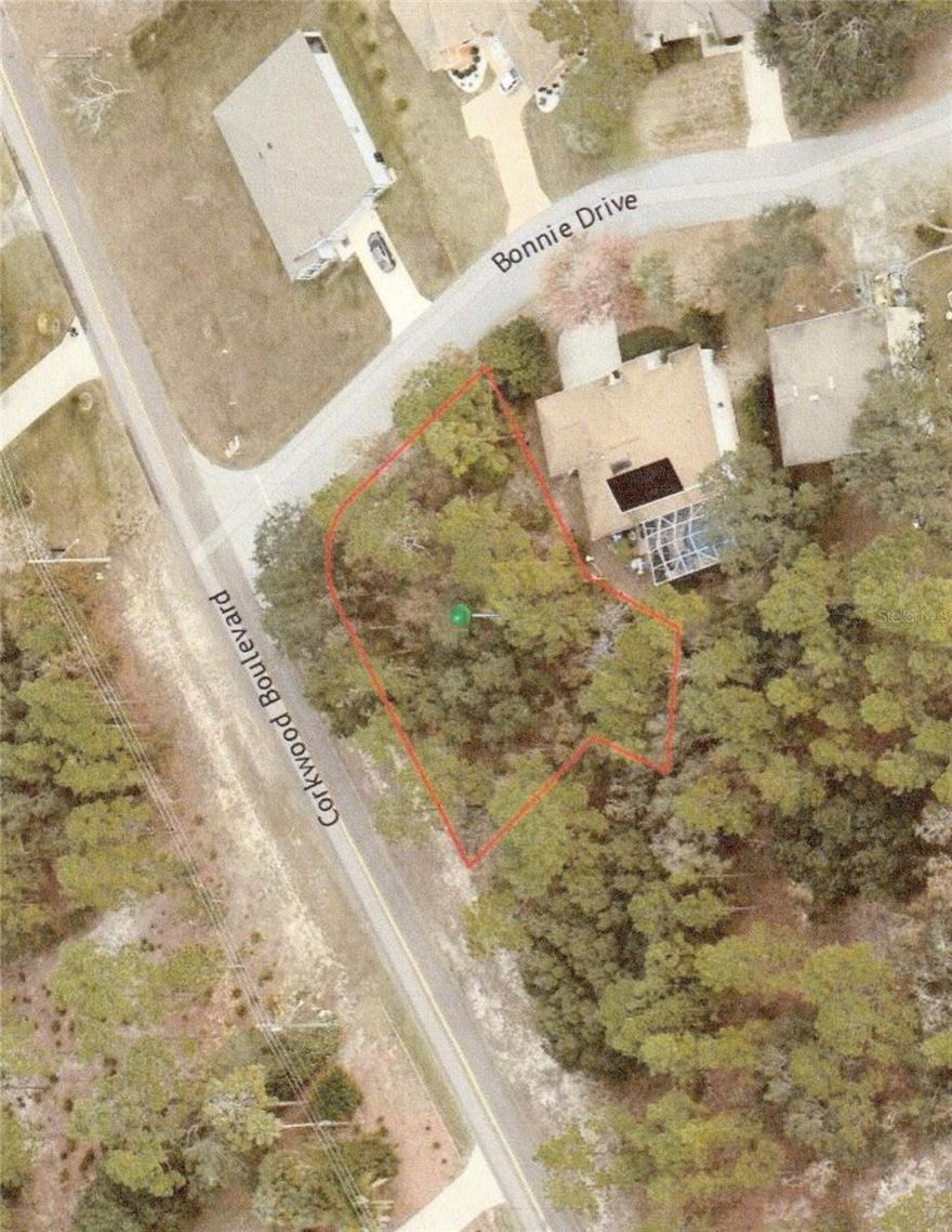 Oversized Build-able Corner Lot available in developing community! Negotiable! NO SIGN! Located NE Corner of Corkwood Blvd. and Bonnie Dr.