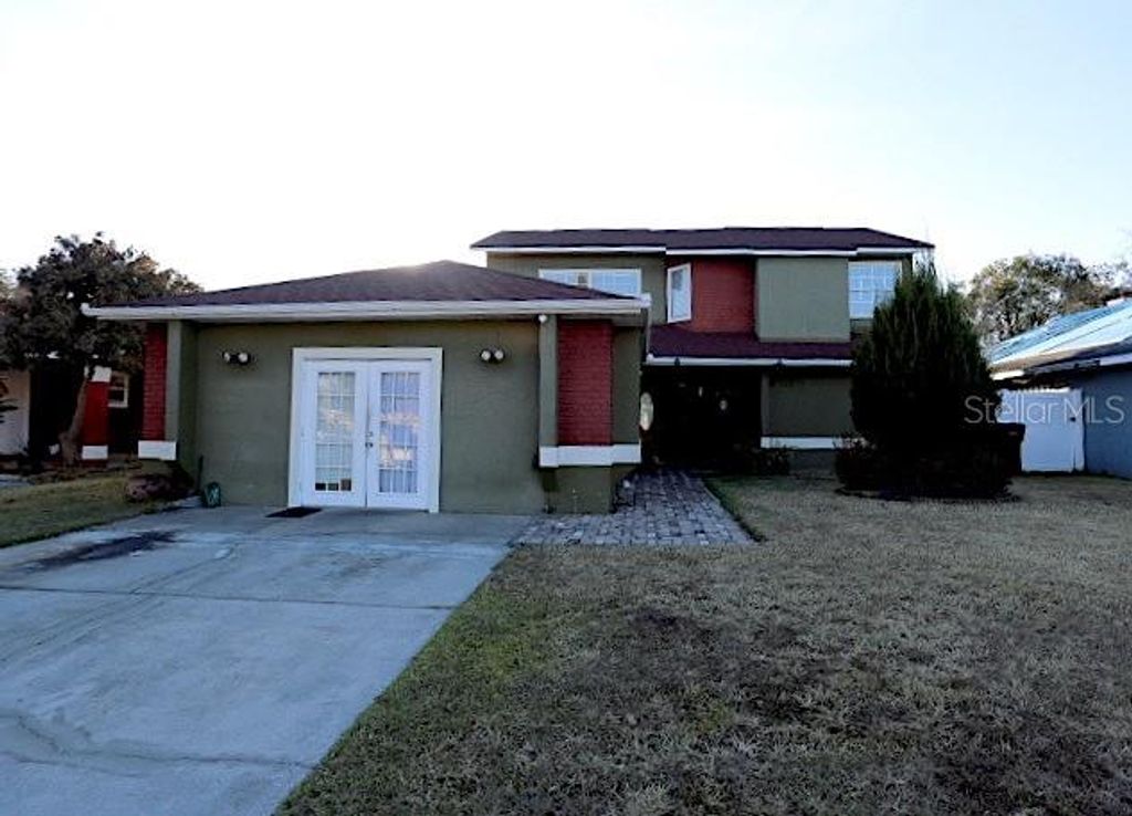 Photo of 12572 Wisconsin Woods Lane, Orlando, FL 32824 (MLS # S5143870)