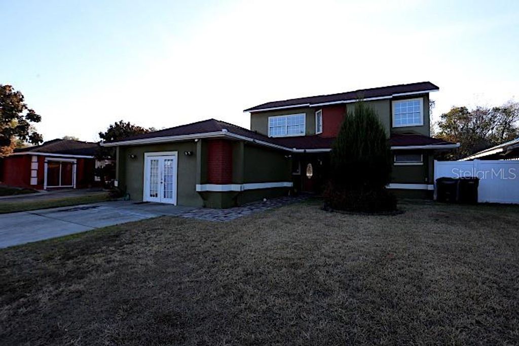 Photo of 12572 Wisconsin Woods Lane, Orlando, FL 32824 (MLS # S5143870)