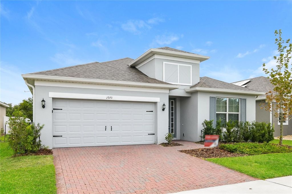Photo of 1073 Hendon Loop, Davenport, FL 33837 (MLS # C7519859)