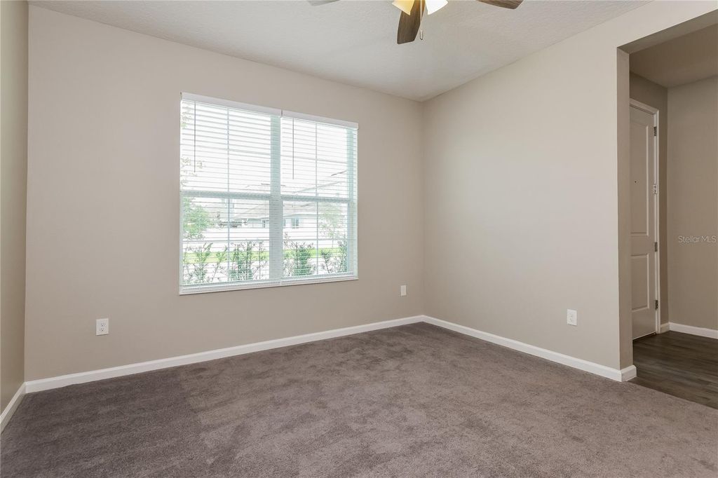 Photo of 1073 Hendon Loop, Davenport, FL 33837 (MLS # C7519859)