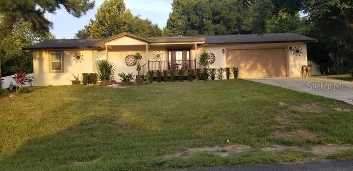 Bring your buyers to this move in ready home. Located in The Oranges community, conveniently located close to major roadways, restaurants, shopping, lake Louisa Reserve/boat ramp and hospitals. Enter through the front door into a living/dining/kitchen combo room with easy care Italian tile flooring. Kitchen features a huge island for perfect family gatherings, cooktop and free standing microwave/oven combo. Sliders led to a spacious area that has so many uses. Home went through total renovation few years ago including newer windows, roof, water heather and A/C. The back yard is large with endless possibilities. Low HOA fees, cute balcony with partial water views. This property could be a great starter home, retirement home, part time home for snowbirds or those looking to downsize.
