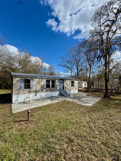 Photo of 6240 Woodsman Drive, Zephyrhills, FL 33544 (MLS # TB8478081)