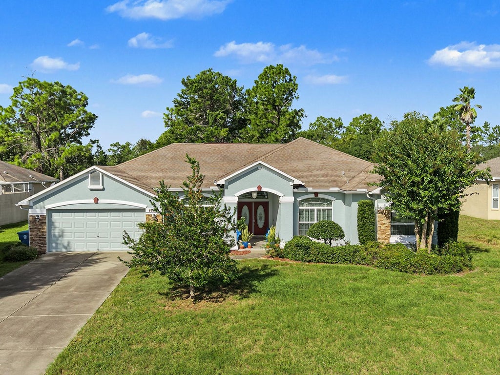 Photo of 4887 Sand Ridge Boulevard, Spring Hill, FL 34609 (MLS # TB8560318)