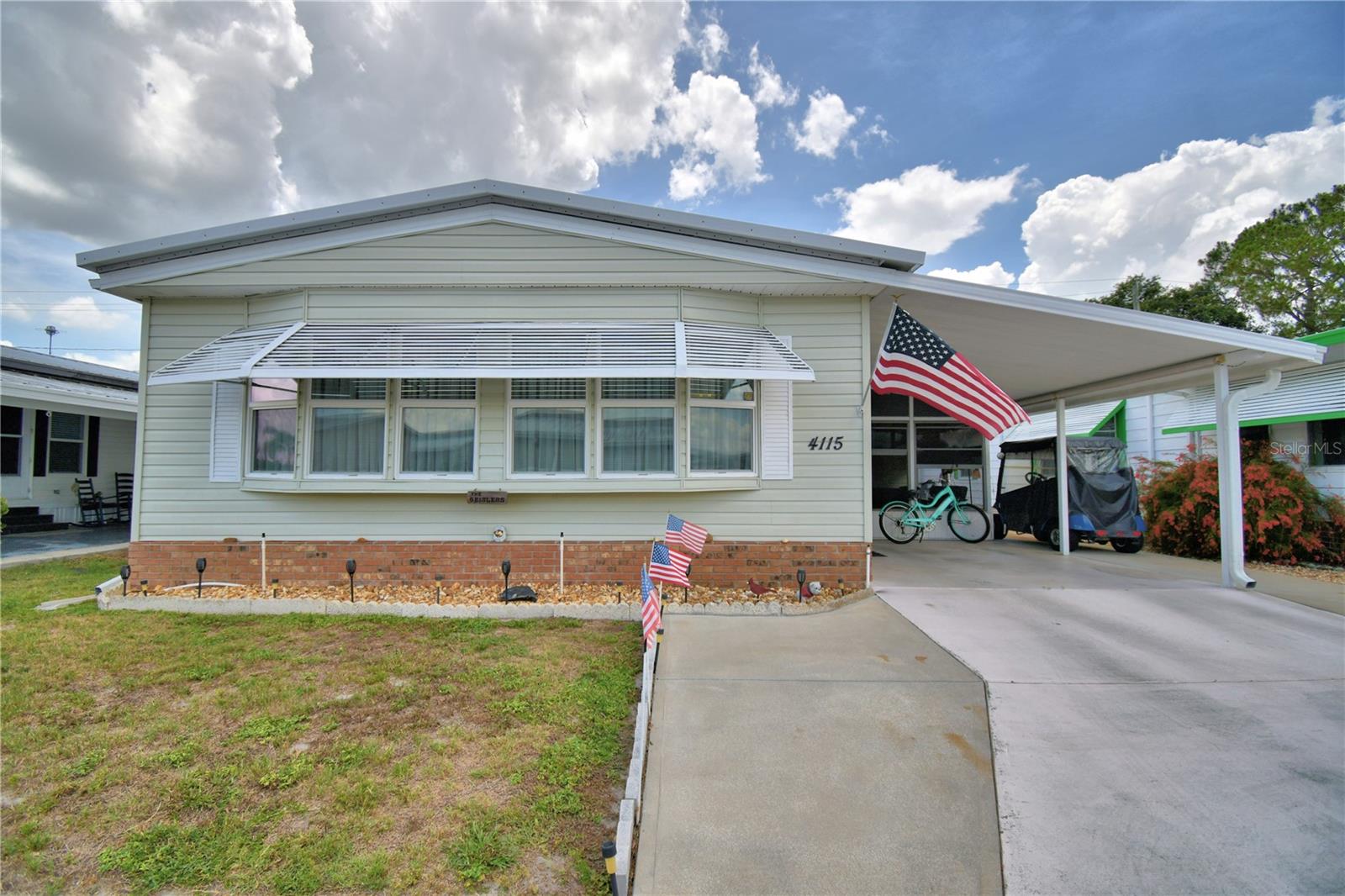 This is a must see home!! This home has two porch areas plus a bonus room. The side porch is perfect for enjoying your morning coffee and watching the world go by. Pass through the laundry and shop area and find the bonus room. Perfect for a home office or man cave. The living room is spacious and comfortable. Each bedroom has it's own walk in closet for lots of storage. Walk through the home to the back porch that is vented with air conditioning and included in the living square footage. This is a perfect area to sit and read your favorite book, or just enjoy the peaceful view and wildlife. Or you can step outside and enjoy the patio which offers two sheds for extra outdoor storage. This home is located in Oakwood Estates, an active 55+ community. You can join in on the monthly dinner pot lucks, or the Wednesday morning coffee and donuts, or the bi monthly ice cream socials. Oakwood offers many amenities including two pools, two clubhouses, shuffleboard, tennis courts, miniature golf, and much much more!! Call for your appointment today.