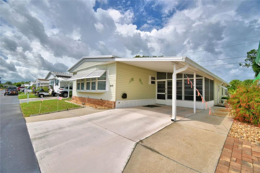 This is a must see home!!  This home has two porch areas plus a bonus room.  The side porch is perfect for enjoying your morning coffee and watching the world go by.  Pass through the laundry and shop area and find the bonus room. Perfect for a home office or man cave.  The living room is spacious and comfortable.  Each bedroom has it's own walk in closet for lots of storage.  Walk through the home to the back porch that is vented with air conditioning and included in the living square footage.  This is a perfect area to sit and read your favorite book, or just enjoy the peaceful view and wildlife.  Or you can step outside and enjoy the patio which offers two sheds for extra outdoor storage.  This home is located in Oakwood Estates, an active 55+ community.  You can join in on the monthly dinner pot lucks, or the Wednesday morning coffee and donuts, or the bi monthly ice cream socials.  Oakwood offers many amenities including two pools, two clubhouses, shuffleboard, tennis courts, miniature golf, and much much more!!  Call for your appointment today.