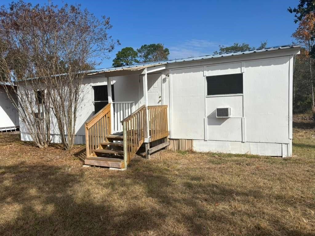 Photo of 343 NE 884th Avenue, Old Town, FL 32680 (MLS # TB8457927)