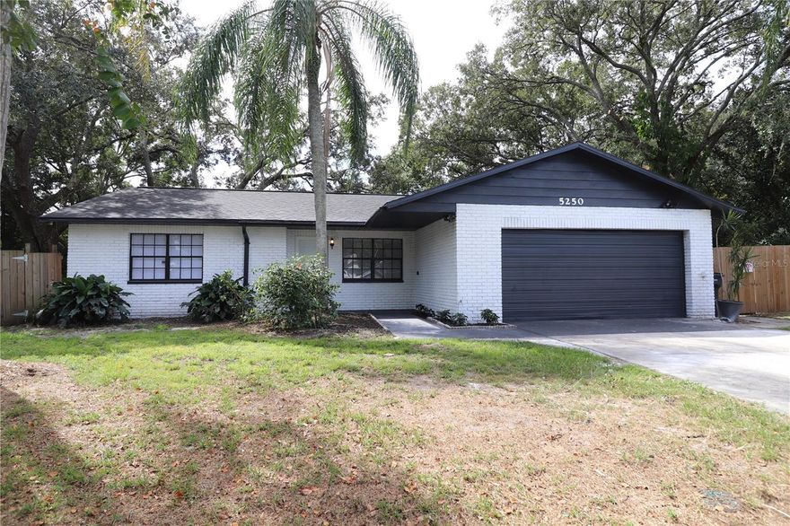 Located in a quiet cul-de-sac, this fully remodeled 3/2 home offers the perfect blend of modern luxury and tropical charm. The open-concept living space is flooded with natural light, creating a warm and inviting atmosphere. The heart of the home is in this spacious kitchen, which has been thoughtfully updated with sleek granite countertops, stainless steel appliances, and custom cabinetry. The master bedroom features a generous walk-in closet for all your storage needs. One of the standout features of this home is the screened back porch. This outdoor space is perfect for hosting barbecues, sipping your morning coffee, or unwinding with a good book. Don't miss this opportunity to make this fully remodeled Florida gem your forever home. Schedule your private showing today and start living the Florida dream! **Special program with seller's preferred Lender now has down payment assistance and contribution towards closing costs.**